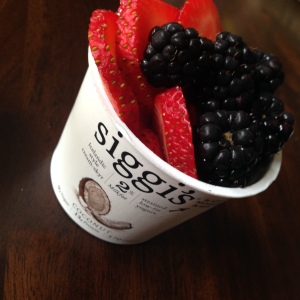 Coconut-flavored Siggi's topped with fresh berries